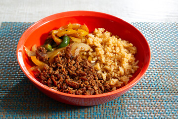 A view of a bowl of ground beef fajitas.