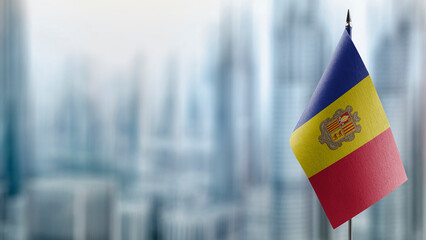 A small Andorra flag on an abstract blurry background
