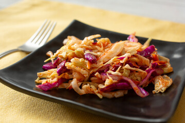 A view of a small plate of BBQ coleslaw.