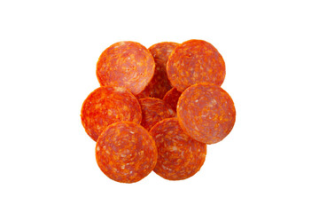 A top down view of a pile of pepperoni slices, against a white background. © DAVID