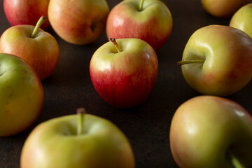A view of a pile of crimson gold apples.
