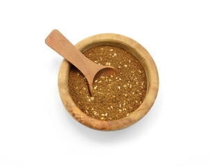 Zaatar spice isolated on white. Pile of zatar (za'atar), a middle eastern spice mix with sesame seeds, salt, oregano, thyme, and marjoram - isolated. herb spice 