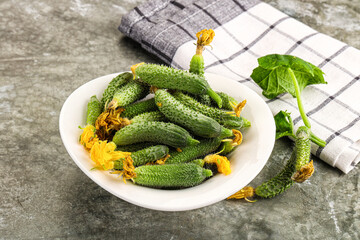 Raw gherkin cucumbers in the bowl