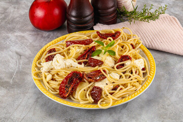 Italian spaghetti with stracciatella and tomato