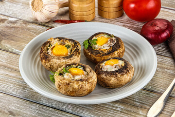 Baked champignon with quail egg