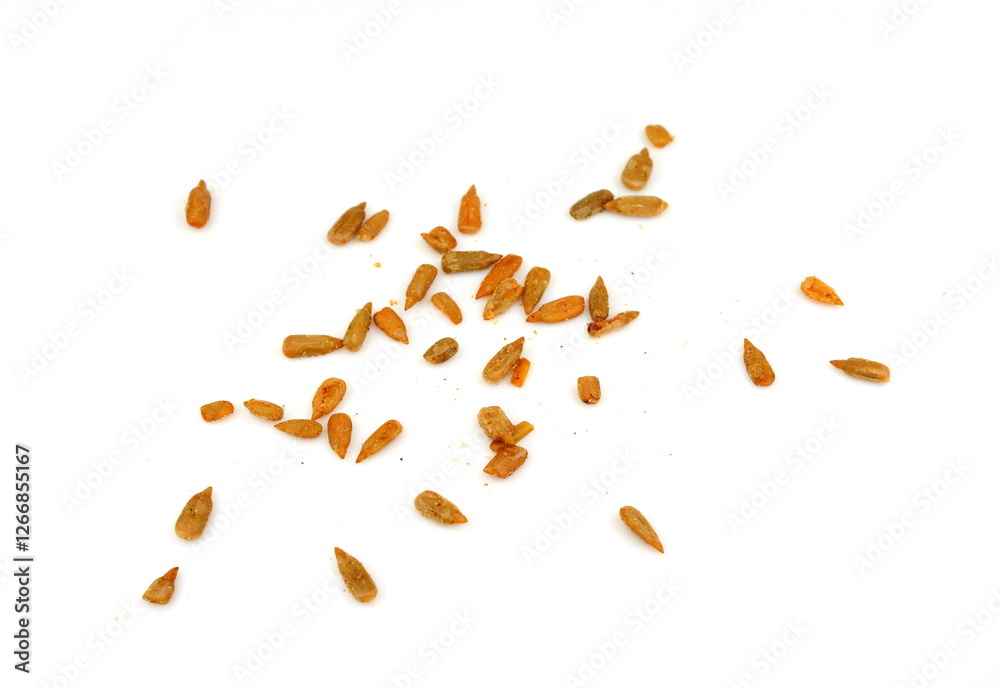 Wall mural roasted sunflower seeds isolated on white background. Roasted Salted Sunflower Seeds