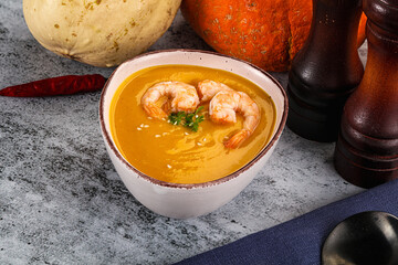 Pumpkin cream soup with prawns