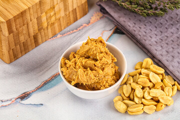 Crunchy peanut butter fat product