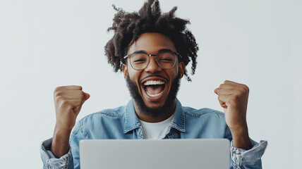 A focused image of a person with a laptop, showing an online diploma against a white backdrop.