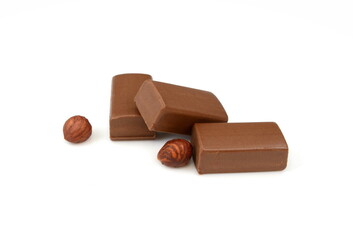 Pure hazelnut nougat bar isolated. Chocolate sweet with nougat isolated on white background.