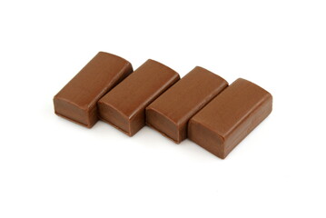 Pure hazelnut nougat bar isolated. Chocolate sweet with nougat isolated on white background.