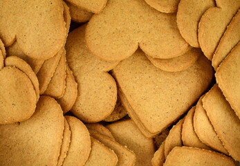 Gingerbread cookies in the form of heart background. 