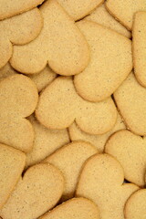 Gingerbread cookies in the form of heart background. 