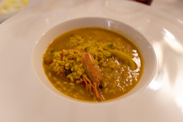 Shrimp and calamari rice on plate