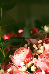 Bouquet of pink shrub roses as a background, flower arrangement