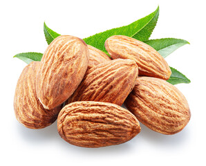Pile of shelled almond nuts with green almond leaf isolated on white background. File contains clipping path.