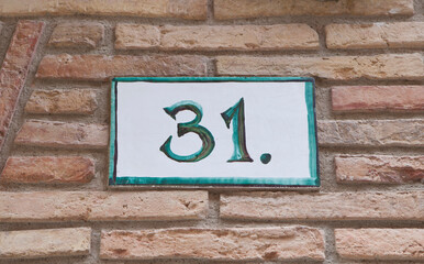 House number 31 thirty one. Houses numbers with personality at Estella, Navarre, Spain