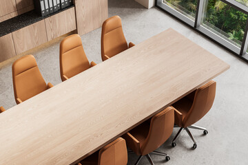Modern office interior with wooden conference table and brown chairs. 3D Rendering