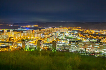 building made with precast concrete slabs by night