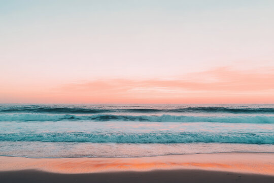 Gentle Ocean Waves Under a Soft Pastel Sunset with Pink and Blue Hues