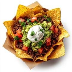 Top-down photograph of the most delicious nachos with ground beef, guacamole, and sour cream in a...