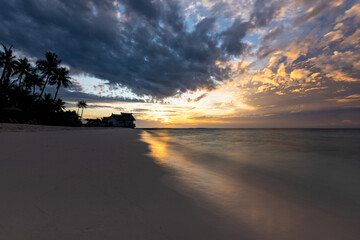 Sunrise over a beach in the Maldives