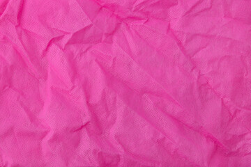 Fototapeta premium Abstract wrinkled pink crumpled fabric texture background 
