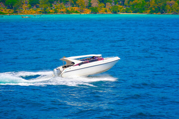 Fototapeta premium Speed boat sea rush on water Thailand around island