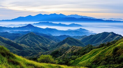 Naklejka premium Majestic Mountain Landscape with Rolling Hills and Soft Clouds at Sunrise Over the Horizon