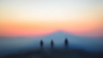 Blurred Mountain Summit with Distant Climbers, a majestic peak shrouded in mist, adventurous souls journeying towards the heights.