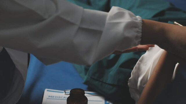 Doctor Measuring arterial blood pressure man patient Health care in hospital