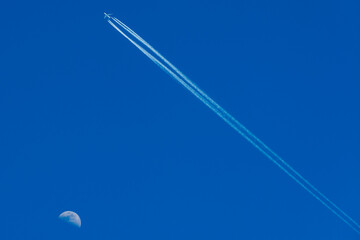 Fototapeta premium Plane and the Moon