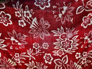 Red fabric with floral print design, Cherry blossoms.