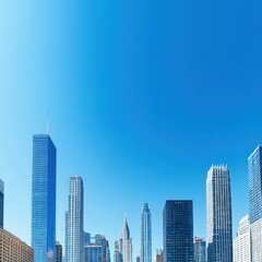 Urban skyline with clear blue sky backdrop.