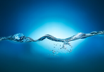 Clear blue water wave with a smooth surface is captured in motion, showcasing a dynamic and refreshing scene of natural fluidity.