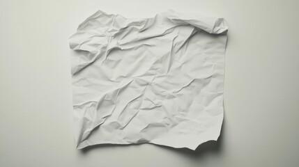 Obraz premium Crumpled white paper texture, studio shot, plain background, design mockup