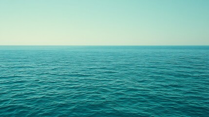 Obraz premium Serene Ocean Surface Under a Calm Sky