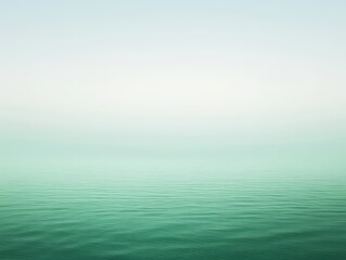 Obraz premium Serene Teal Ocean Mist Calm Water Background