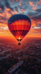 Fototapeta premium Sunrise Hot Air Balloon Ride Over Cityscape