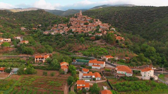 Aerial view of Eus, the medieval hilltop town in Pyrenees mountains, France. 
