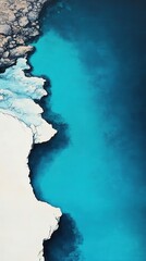 Aerial View of a Coastal Landscape with Blue Water and Rocky Shore © JFM