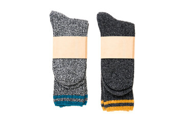 Top view of grey woolen winter socks on white background