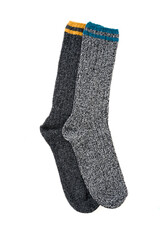 Top view of grey woolen winter socks on white background