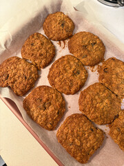 Tray of freshly baked oat cookies.