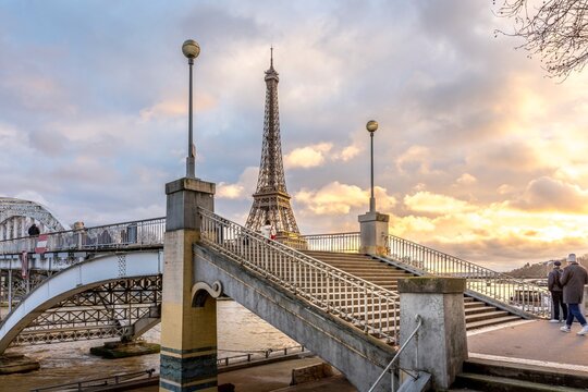 Paris, France - January 30, 2025: Nice panorama with Eiffel Tower and passerelle Debilly in foreground in Paris - Powered by Adobe