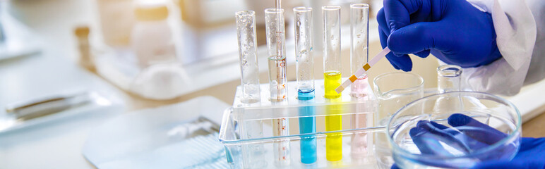 Tap water samples for analysis. Selective focus.