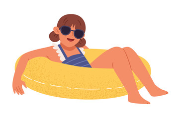 A cute girl in a swimsuit swims on an inflatable circle.