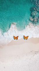 Obraz premium Aerial View of a White Beach with Butterflies and Colorful Waves