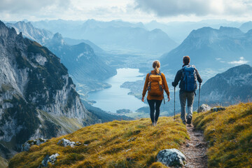 Fototapeta premium Couple Hiking on a Mountain Trail Overlooking a Serene Lake During a Cloudy Day in Switzerland