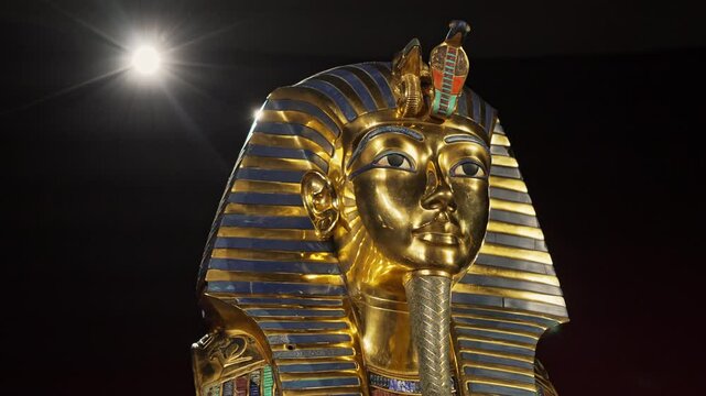 Golden funerary mask of Tutankhamen. Tutankhamun famous pharaoh in ancient Egypt. Tomb, symbol of antique history